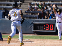 The Yolo High Wheelers (14) beat the Oakland Ballers (4) in game 1 (round 1) of the Pioneer Baseball League's playoffs in Davis, Calif., on...