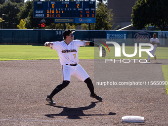 The Yolo High Wheelers (14) beat the Oakland Ballers (4) in game 1 (round 1) of the Pioneer Baseball League's playoffs in Davis, Calif., on...