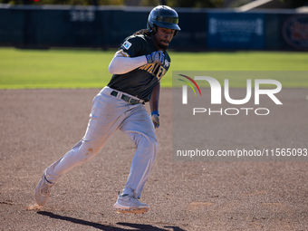 The Yolo High Wheelers (14) beat the Oakland Ballers (4) in game 1 (round 1) of the Pioneer Baseball League's playoffs in Davis, Calif., on...