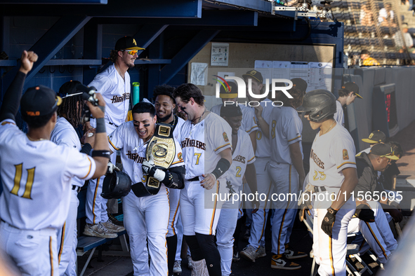 The Yolo High Wheelers (14) beat the Oakland Ballers (4) in game 1 (round 1) of the Pioneer Baseball League's playoffs in Davis, Calif., on...