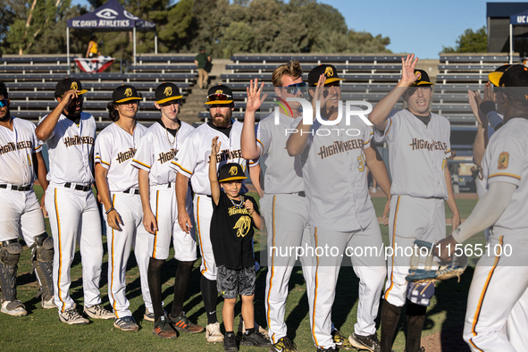 The Yolo High Wheelers (14) beat the Oakland Ballers (4) in game 1 (round 1) of the Pioneer Baseball League's playoffs in Davis, Calif., on...