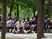 Elderly people relax at a park on Lindai Road in Fuyang, China, on September 11, 2024. (