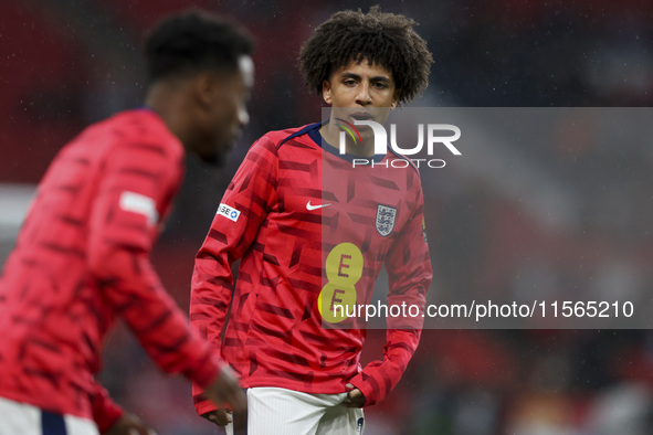 Rico Lewis of England warms up during the UEFA Nations League Group 2 match between England and Finland at Wembley Stadium in London, Englan...