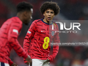 Rico Lewis of England warms up during the UEFA Nations League Group 2 match between England and Finland at Wembley Stadium in London, Englan...