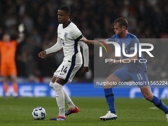 Ezri Konsa of England on the ball during the UEFA Nations League Group 2 match between England and Finland at Wembley Stadium in London, Eng...