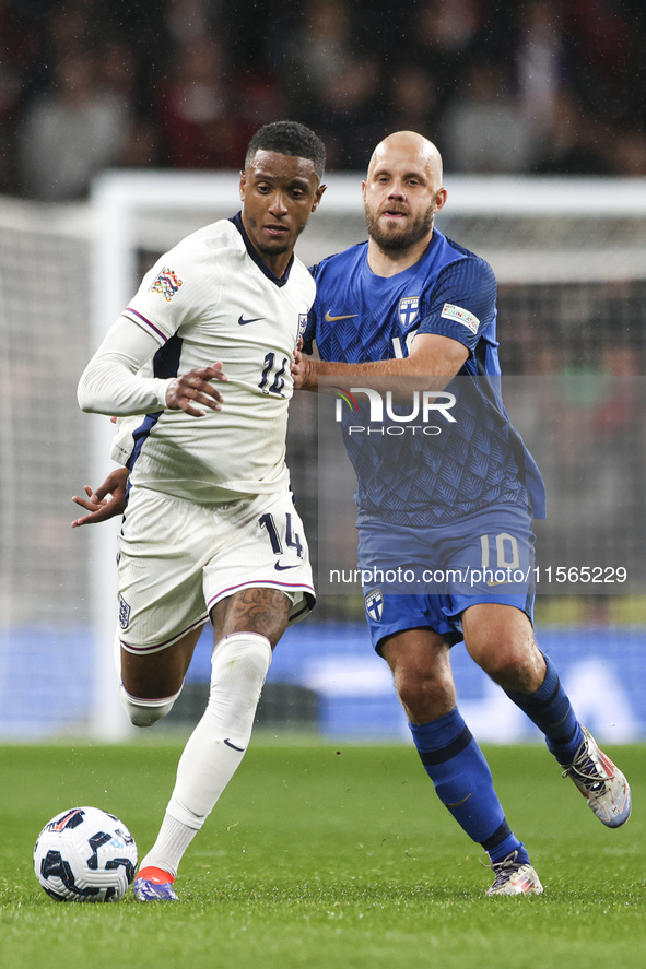 Ezri Konsa of England on the ball during the UEFA Nations League Group 2 match between England and Finland at Wembley Stadium in London, Eng...