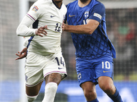 Ezri Konsa of England on the ball during the UEFA Nations League Group 2 match between England and Finland at Wembley Stadium in London, Eng...