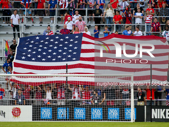 An American flag is seen during the National Anthem prior to the start of the friendly soccer match between the United States Men's National...