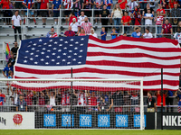 An American flag is seen during the National Anthem prior to the start of the friendly soccer match between the United States Men's National...