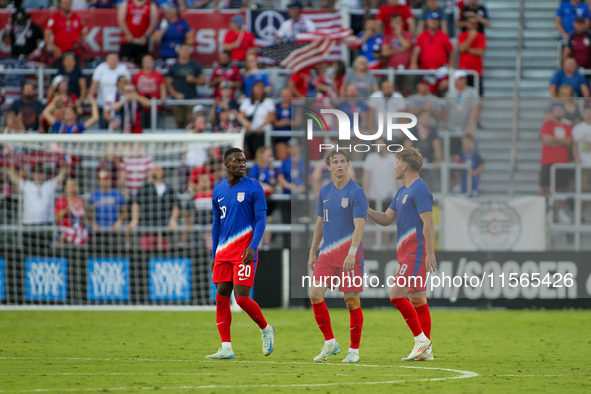 USA players await a goal review during the friendly soccer match between the United States Men's National Team and New Zealand at TQL Stadiu...