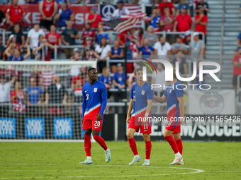 USA players await a goal review during the friendly soccer match between the United States Men's National Team and New Zealand at TQL Stadiu...