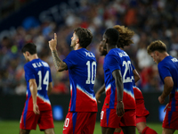 USA's Christian Pulisic is seen after scoring a goal during the friendly soccer match between the United States Men's National Team and New...