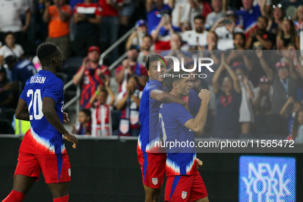 USA's Christian Pulisic is seen after scoring a goal during the friendly soccer match between the United States Men's National Team and New...