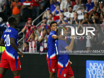 USA's Christian Pulisic is seen after scoring a goal during the friendly soccer match between the United States Men's National Team and New...