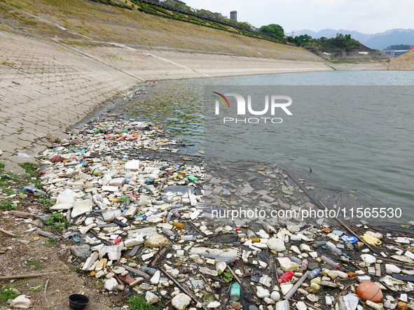 A small amount of floating objects is seen in the backbend of part of the Three Gorges Reservoir in Yichang, Hubei province, China, on Septe...