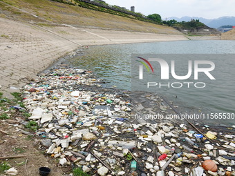 A small amount of floating objects is seen in the backbend of part of the Three Gorges Reservoir in Yichang, Hubei province, China, on Septe...