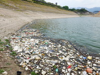 A small amount of floating objects is seen in the backbend of part of the Three Gorges Reservoir in Yichang, Hubei province, China, on Septe...