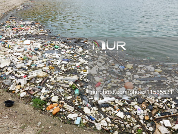 A small amount of floating objects is seen in the backbend of part of the Three Gorges Reservoir in Yichang, Hubei province, China, on Septe...