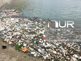 A small amount of floating objects is seen in the backbend of part of the Three Gorges Reservoir in Yichang, Hubei province, China, on Septe...