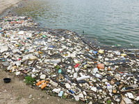 A small amount of floating objects is seen in the backbend of part of the Three Gorges Reservoir in Yichang, Hubei province, China, on Septe...