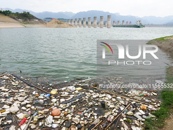 A small amount of floating objects is seen in the backbend of part of the Three Gorges Reservoir in Yichang, Hubei province, China, on Septe...