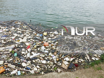 A small amount of floating objects is seen in the backbend of part of the Three Gorges Reservoir in Yichang, Hubei province, China, on Septe...