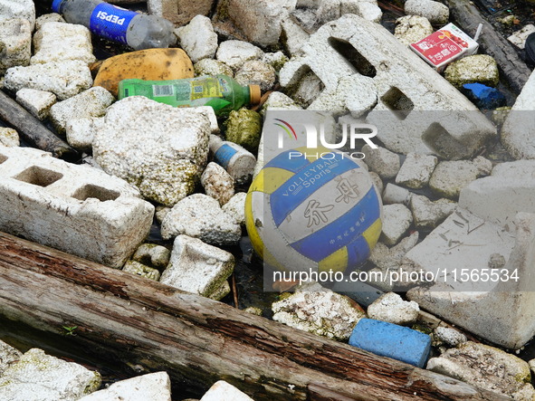 A small amount of floating objects is seen in the backbend of part of the Three Gorges Reservoir in Yichang, Hubei province, China, on Septe...