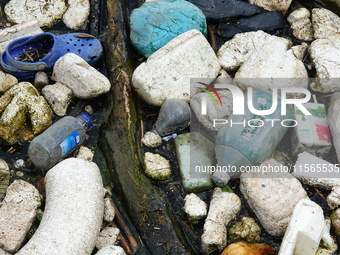 A small amount of floating objects is seen in the backbend of part of the Three Gorges Reservoir in Yichang, Hubei province, China, on Septe...