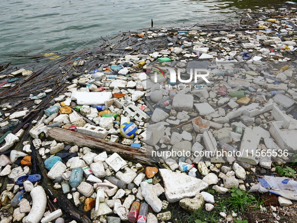 A small amount of floating objects is seen in the backbend of part of the Three Gorges Reservoir in Yichang, Hubei province, China, on Septe...