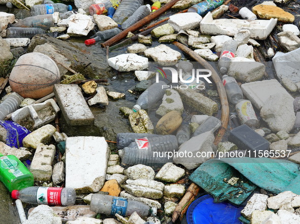 A small amount of floating objects is seen in the backbend of part of the Three Gorges Reservoir in Yichang, Hubei province, China, on Septe...