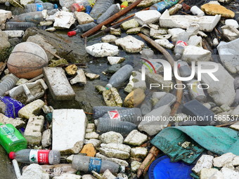 A small amount of floating objects is seen in the backbend of part of the Three Gorges Reservoir in Yichang, Hubei province, China, on Septe...