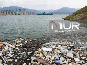 A small amount of floating objects is seen in the backbend of part of the Three Gorges Reservoir in Yichang, Hubei province, China, on Septe...