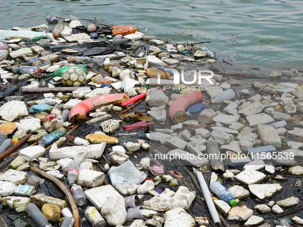 A small amount of floating objects is seen in the backbend of part of the Three Gorges Reservoir in Yichang, Hubei province, China, on Septe...