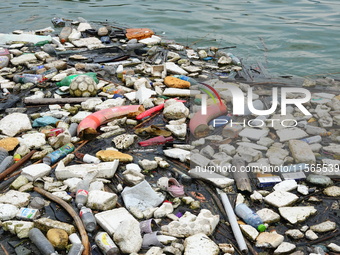 A small amount of floating objects is seen in the backbend of part of the Three Gorges Reservoir in Yichang, Hubei province, China, on Septe...