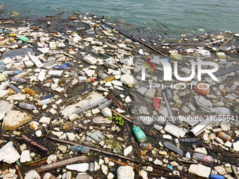 A small amount of floating objects is seen in the backbend of part of the Three Gorges Reservoir in Yichang, Hubei province, China, on Septe...