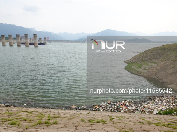 A small amount of floating objects is seen in the backbend of part of the Three Gorges Reservoir in Yichang, Hubei province, China, on Septe...