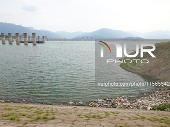 A small amount of floating objects is seen in the backbend of part of the Three Gorges Reservoir in Yichang, Hubei province, China, on Septe...