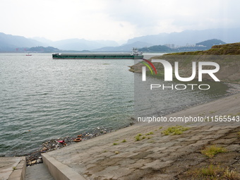 A small amount of floating objects is seen in the backbend of part of the Three Gorges Reservoir in Yichang, Hubei province, China, on Septe...