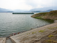 A small amount of floating objects is seen in the backbend of part of the Three Gorges Reservoir in Yichang, Hubei province, China, on Septe...