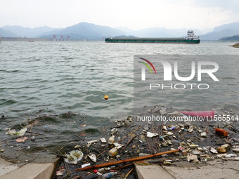 A small amount of floating objects is seen in the backbend of part of the Three Gorges Reservoir in Yichang, Hubei province, China, on Septe...