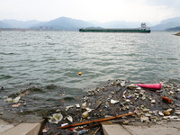 A small amount of floating objects is seen in the backbend of part of the Three Gorges Reservoir in Yichang, Hubei province, China, on Septe...