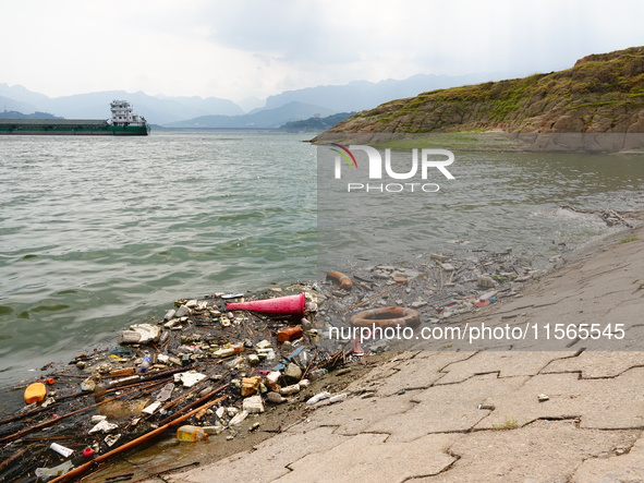 A small amount of floating objects is seen in the backbend of part of the Three Gorges Reservoir in Yichang, Hubei province, China, on Septe...