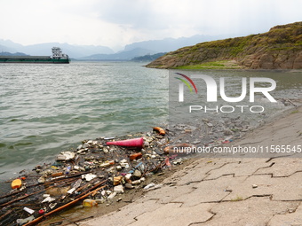 A small amount of floating objects is seen in the backbend of part of the Three Gorges Reservoir in Yichang, Hubei province, China, on Septe...