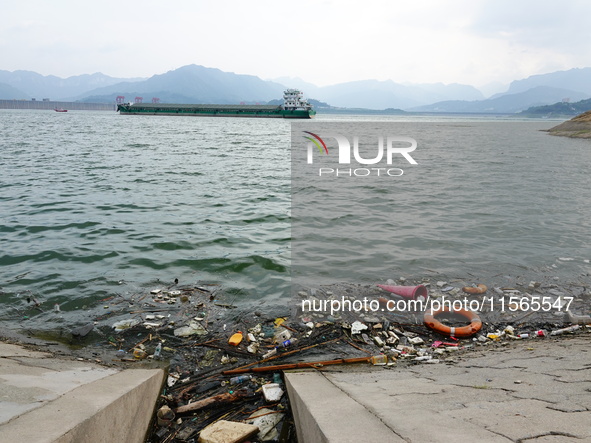 A small amount of floating objects is seen in the backbend of part of the Three Gorges Reservoir in Yichang, Hubei province, China, on Septe...