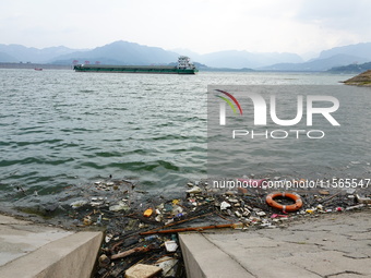 A small amount of floating objects is seen in the backbend of part of the Three Gorges Reservoir in Yichang, Hubei province, China, on Septe...