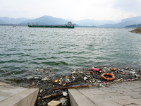 A small amount of floating objects is seen in the backbend of part of the Three Gorges Reservoir in Yichang, Hubei province, China, on Septe...