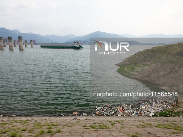 A small amount of floating objects is seen in the backbend of part of the Three Gorges Reservoir in Yichang, Hubei province, China, on Septe...