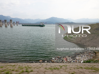 A small amount of floating objects is seen in the backbend of part of the Three Gorges Reservoir in Yichang, Hubei province, China, on Septe...