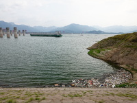 A small amount of floating objects is seen in the backbend of part of the Three Gorges Reservoir in Yichang, Hubei province, China, on Septe...