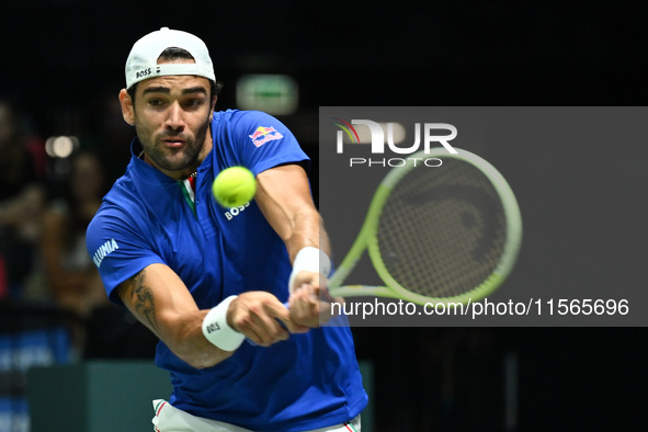 Matteo Berrettini (ITA) is in action during the 2024 Davis Cup Finals Group Stage Bologna match between Italy and Brazil at Unipol Arena in...